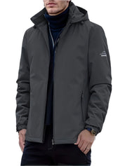 Olie - Deze softshell jas voor heren is ademend, waterafstotend en winddicht.