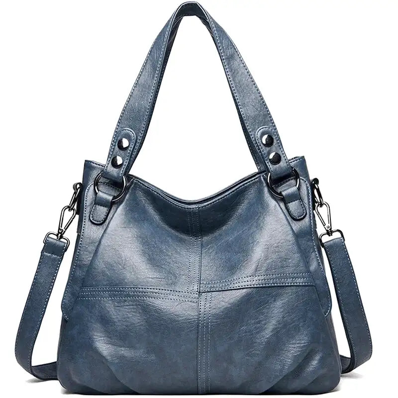 leonor-sac-a-main-de-cours-en-cuir-a-bandouliere-bleu-sac-a-main.webp